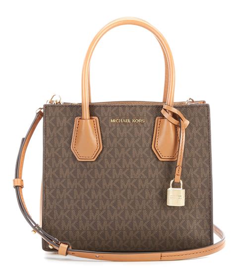 michael kors bags dillards|Michael Kors handbags with compartments.